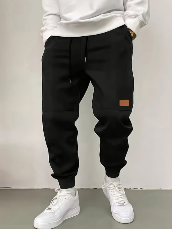 Men's new solid color casual cuff trousers