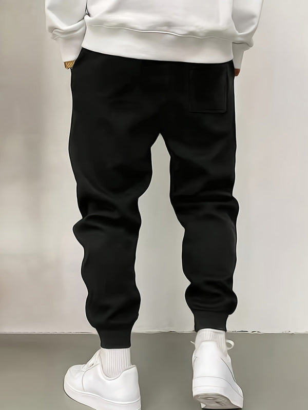 Men's new solid color casual cuff trousers