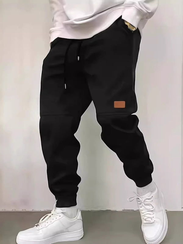 Men's new solid color casual cuff trousers