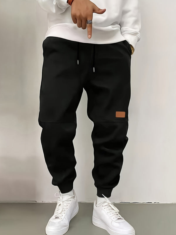 Men's new solid color casual cuff trousers