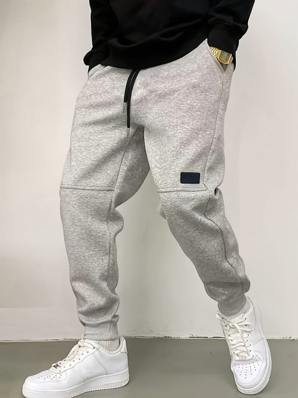 Men's new solid color casual cuff trousers